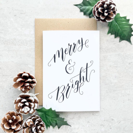 MERRY-AND-BRIGHT-CHRISTMAS-CARD-FRONT-FLATLAY-CALLIGRAPHY
